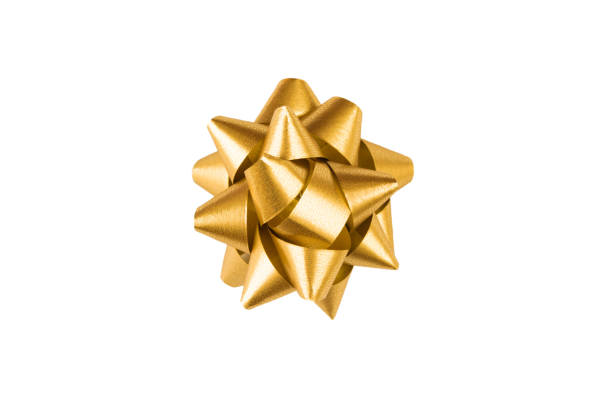istock Golden paper holiday bow over white isolated background. Single object. Mockup. Top view 1173648959