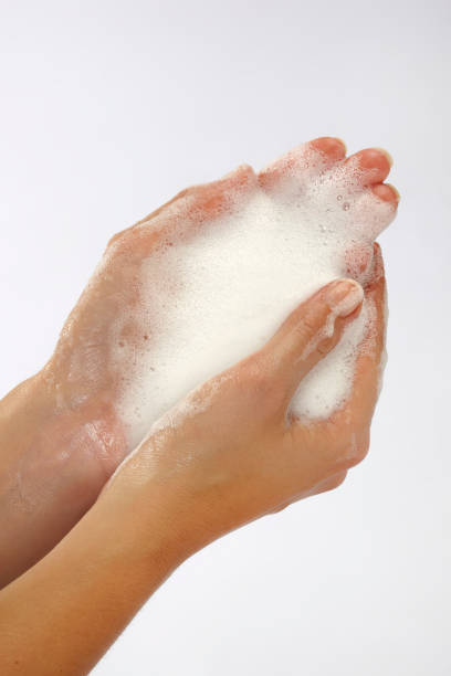 istock close-up of hand washing, soaping hands 1173653602