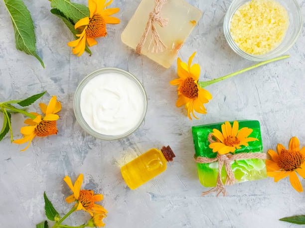 istock cosmetic cream, oil, soap flower calendula 1173658253