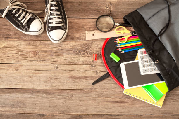istock back to school concept stationery over wooden table 1173660360