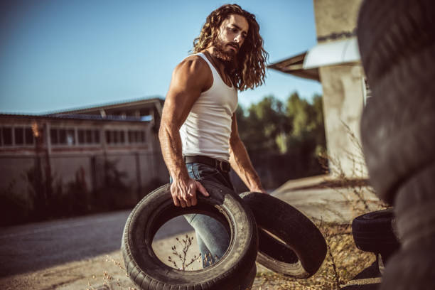 Warehouse automobile tires Mechanic, Tire - Vehicle Part, Auto Mechanic, Warehouse, Wheel hot handsome man stock pictures, royalty-free photos & images