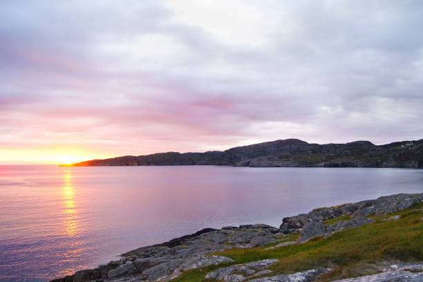 istock Achmelvich beach in the Scottish highlands at sunset 1173661991