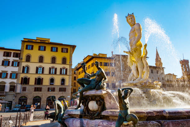 Bronze statue of a satyr, detail of Neptune Fountain in Florence, situated on the \
