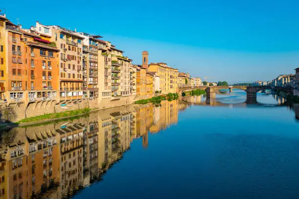 Looking west on the Arno River from the Ponte Vecchio Bridge in Florence, Italy