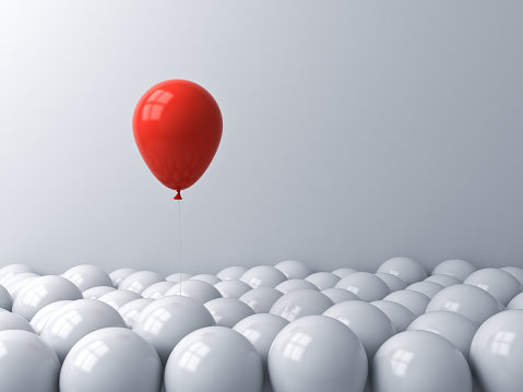 One red balloon pop out from the white balloons Stand out from the crowd different concept or think outside the box creative idea concept 3D rendering