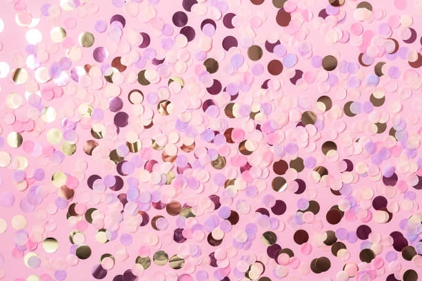istock Pink background with colorful round paper confetti. Copy space. Holiday concept. 1173676596