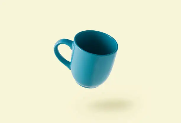 Coffee cup hovering mid-air