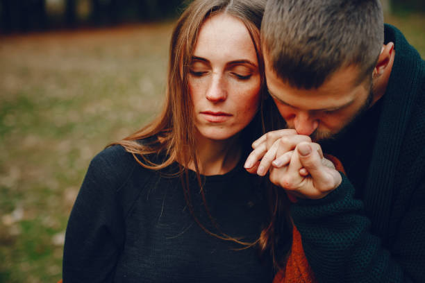 istock Elegant couple spend time in a autumn park 1173683826