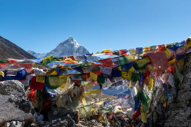 istock Mountain peak above prayer flags in the Himalayan mountains 1173698043