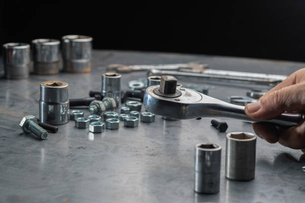 istock Close up automotive mechanic picking tools in garage 1173706064