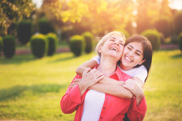 istock Smiling mother with young daughter 1173708584