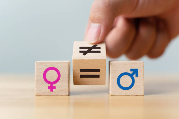 concepts of gender equality. hand flip wooden cube with symbol unequal change to equal sign - sex sexual activity sexual issues couple imagens e fotografias de stock