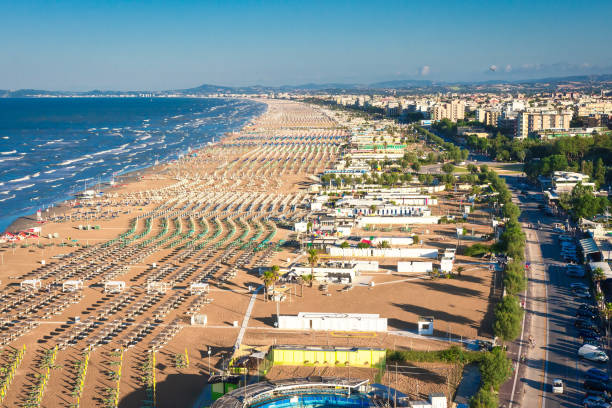 Aerial view on Rimini beach, Italy. Sea vacation in Rimini. Summer rest in Italy Aerial view on Rimini beach, Italy. Sea vacation in Rimini. Summer rest in Rimini emilia romagna photos stock pictures, royalty-free photos & images