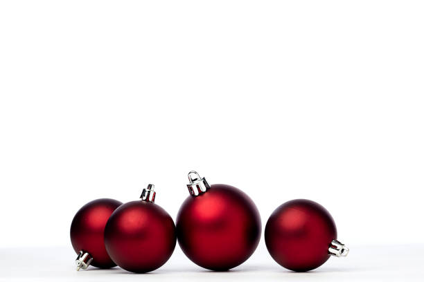istock red christmas balls isolated on white background 1173723184