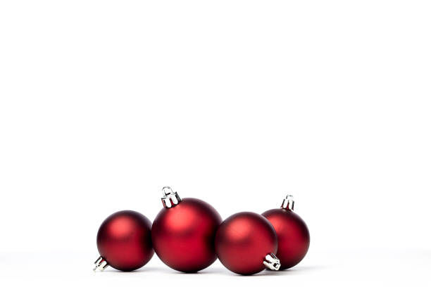 istock red christmas balls isolated on white background 1173723185
