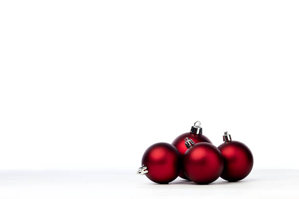 istock red christmas balls isolated on white background 1173723187