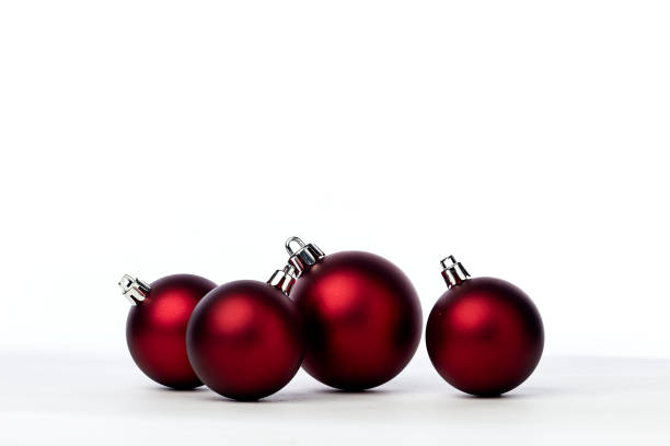 istock red christmas balls isolated on white background 1173723190