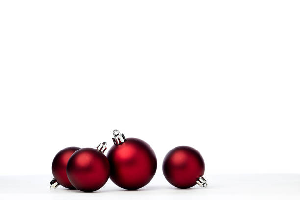 istock red christmas balls isolated on white background 1173723194