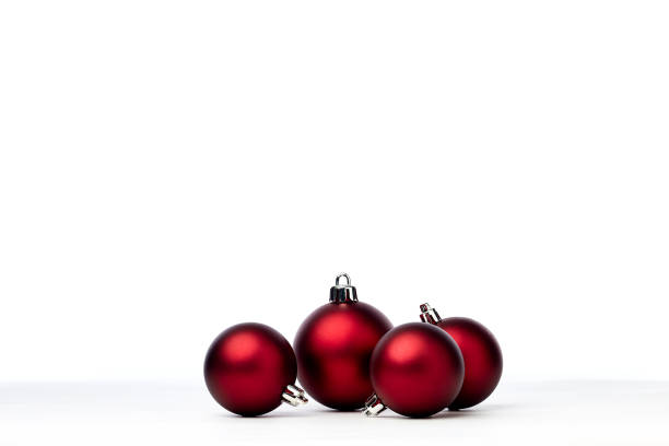 istock red christmas balls isolated on white background 1173723198