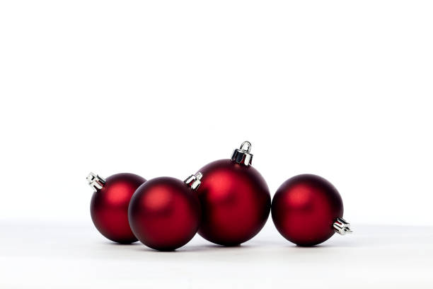 istock red christmas balls isolated on white background 1173723200