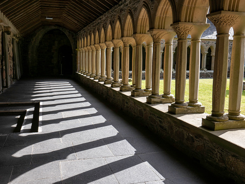 A section of the beautiful medieval cloister at Norwich Cathedral in Norwich, Norfolk, Eastern England.