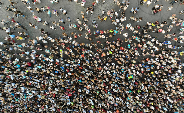 istock Aerial. People crowd on a city square background. Top view. 1173727616