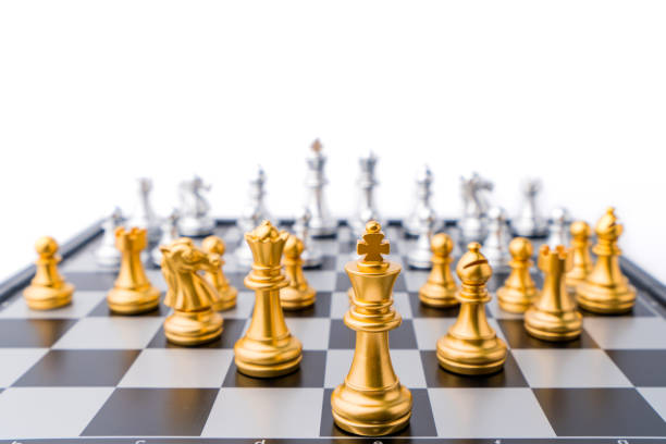 istock chess board game in competition play, Ideas business success concept 1173729316