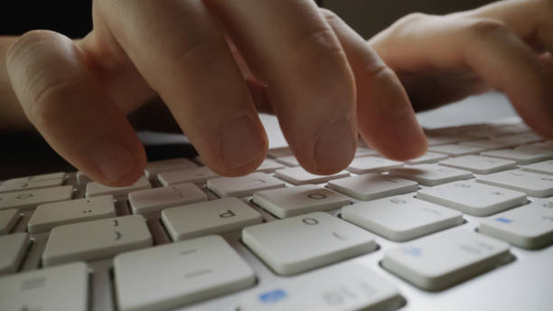 istock Close-up soft-focus finger typing on keyboard. 1173730013