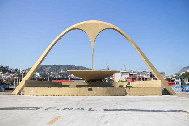 Apotheosis Square in Rio de Janeiro, Brazil Apotheosis Square in Rio de Janeiro, Brazil - August 31, 2019: It is in the Apotheosis Square that there is a large concrete parabolic arch with a pendant in the center. This arch became a symbol of the Rio Sambadrome and another architectural icon created by architect Oscar Niemeyer. latin music photos stock pictures, royalty-free photos & images