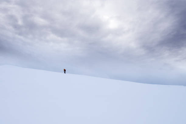 istock Trekker walking towards Storsteinen mountain summit 1173738048