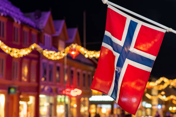 Norwegian flag in Tromso at night stock photo