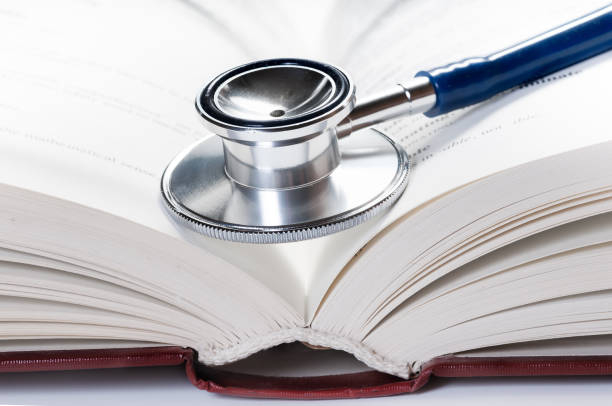 istock Medical stethoscope over book 1173739212