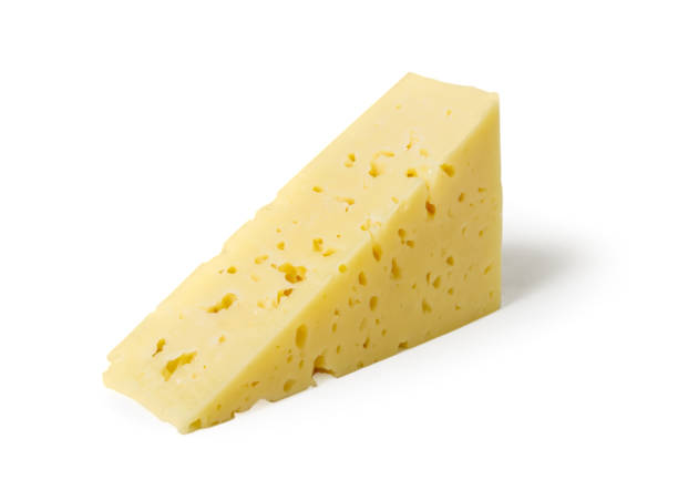istock piece of cheddar cheese isolated 1173739352