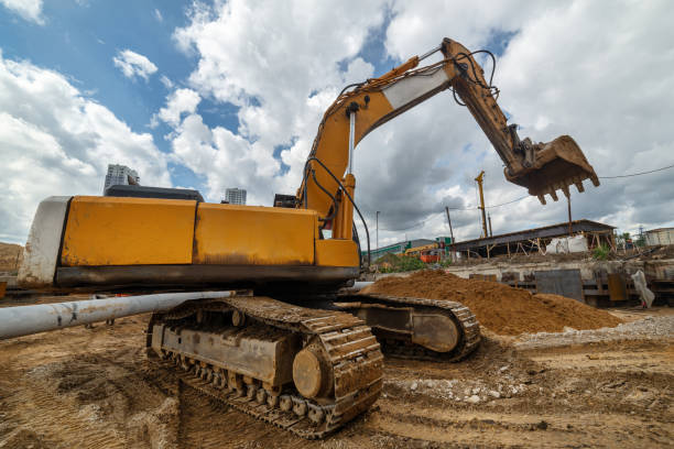 istock Tracked excavator with raised bucket. Modern earthmoving equipment 1173740298