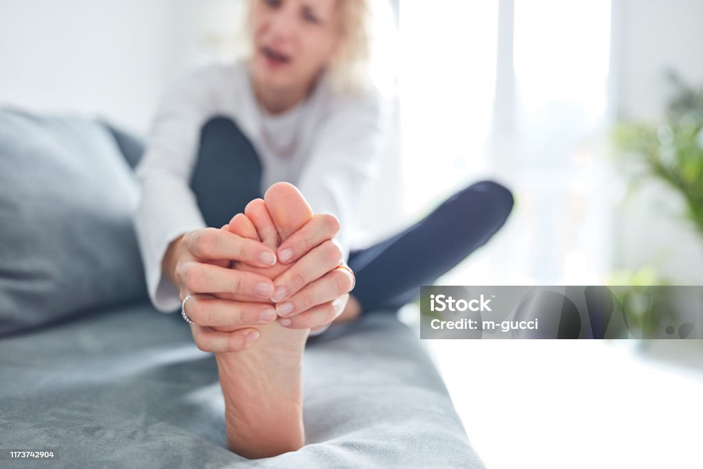 Problems with feet, joints, legs and ankles. Foot Stock Photo