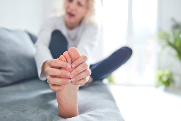 Problems with feet, joints, legs and ankles. stock photo