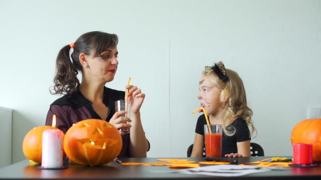 Mother and Daughter Having Fun in Halloween