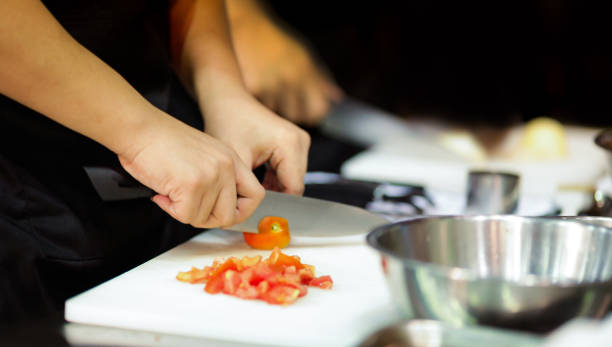 istock Chef preparing food in the kitchen, chef cooking, Chef decorating dish 1173747049