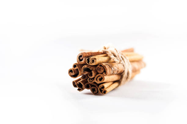 istock Seasonings are isolated on a white background. cinnamon on a white background close-up and copy space. 1173747310