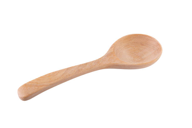 istock wooden spoon isolated on a white background 1173749581