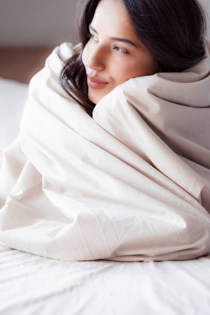 istock Happy lady dreaming about her day ahead 1173750123