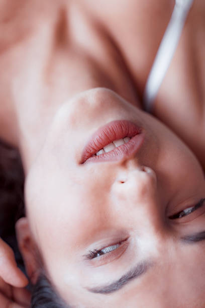 istock Serious young woman relaxing after waking up 1173750154