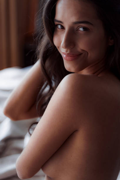 istock Woman feeling refreshed by sleep in the morning 1173750179