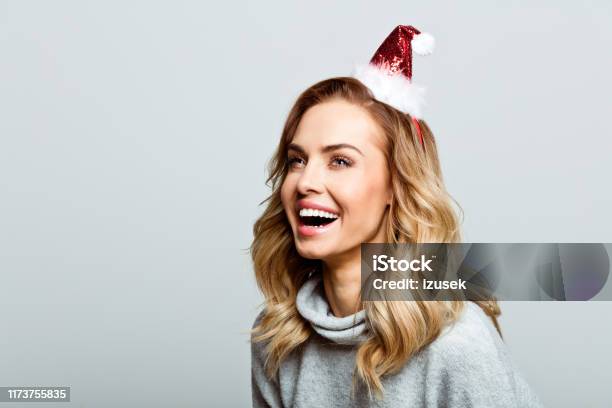 Christmas Portrait Of Excited Beautiful Woman Close Up Of Face Stock Photo Stock Photo - Download Image Now