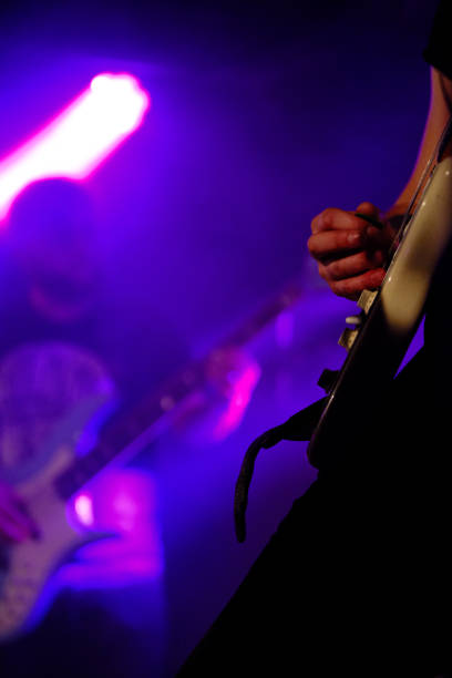 istock Cropped Hands Of Man Playing Guitar 1173762573