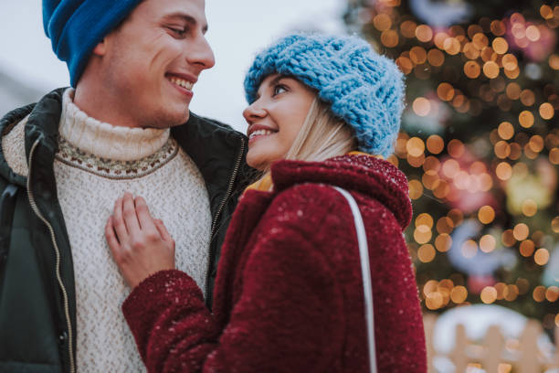 istock Handsome brunette man looking at his girlfriend 1173766868