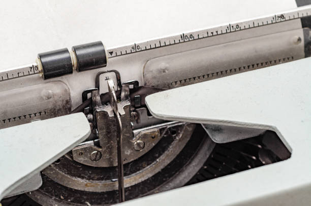 istock Carriage with letters in a mechanical typewriter. Letter pressed 1173770909