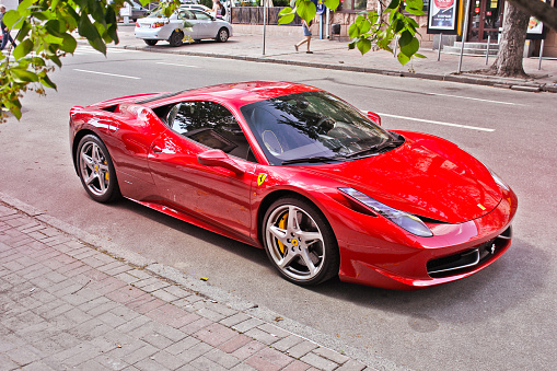 Kiev, Ukraine - June 10, 2013 Ferrari 458 Italia In the city. Red Ferrari in the city