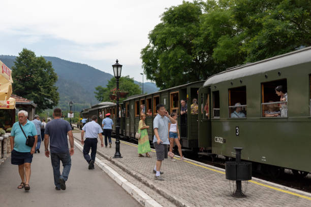 Serbia, July 22nd 2019: Passengers boarding a narrow gauge tourist train for the Šargan Eight (Šarganska osmica) tour at Mokra Gora station.