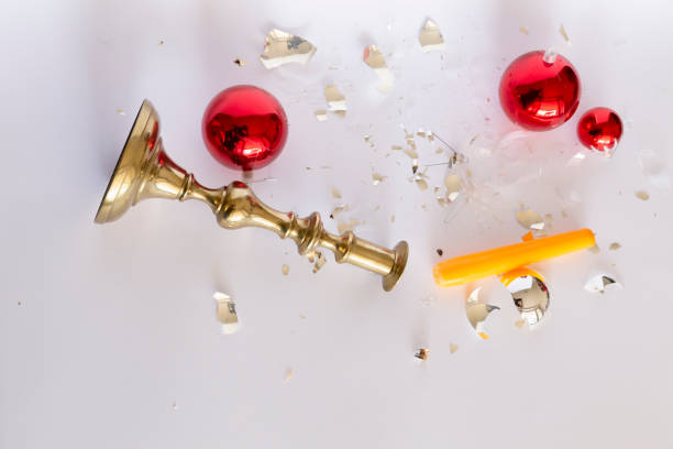 istock Shattered Christmas baubles and overturned bronze candleholder 1173776750